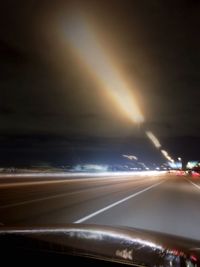 Light trails against sky at night