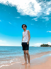 Full length of man standing on beach