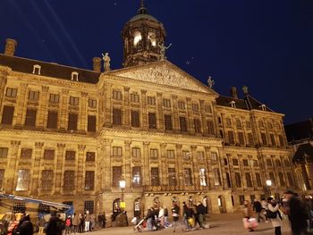 Low angle view of historical building at night