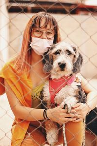 Portrait of woman with dog