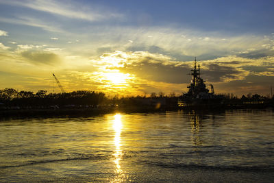 Scenic view of sunset over lake