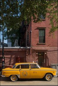 Yellow car on street