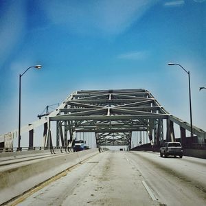 View of road against blue sky