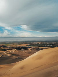 Scenic view of desert against sky