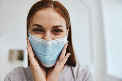 Close-up of woman wearing mask