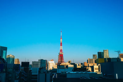 View of buildings against blue sky