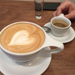 Close-up of cappuccino served on table