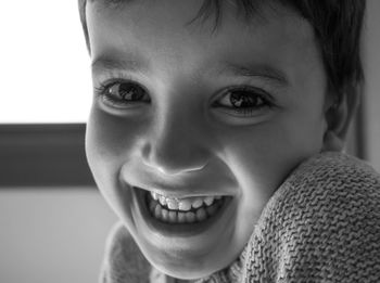 Close-up portrait of smiling boy