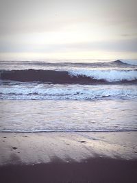 View of beach at sunset