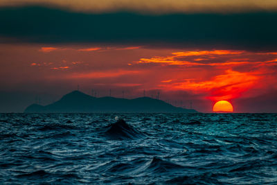 Scenic view of sea against sky during sunset