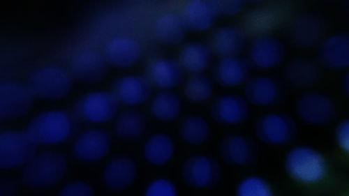 Close-up of illuminated lights at night