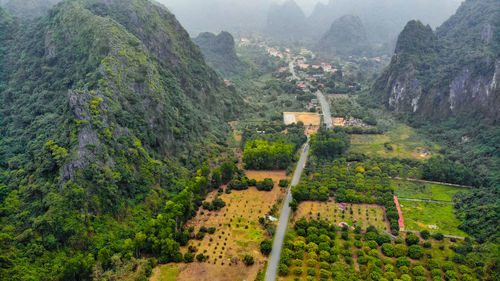 Random drone shot of limestone mountains at countryside in vietnam.