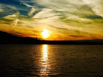 Scenic view of sunset over sea