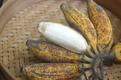 Close-up of ripe bananas with a brownish yellow color