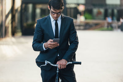 Young man using mobile phone