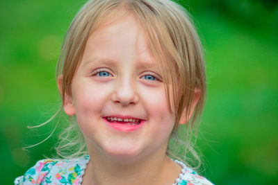 Close-up portrait of smiling girl