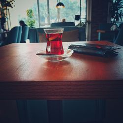 Close-up of red wine on table at restaurant