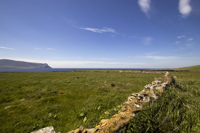 Scenic view of land against sky