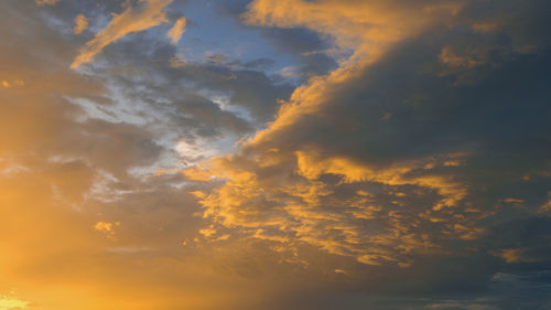 Low angle view of dramatic sky during sunset