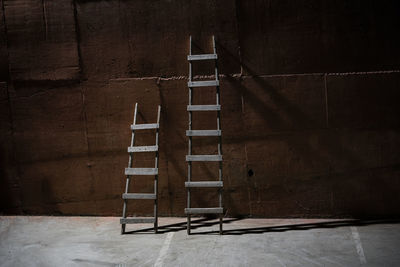 Wooden ladders outdoors during night