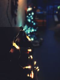 Close-up of illuminated christmas lights at night