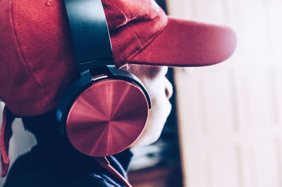 Close-up of man wearing red shirt