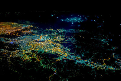 View of illuminated tunnel at night