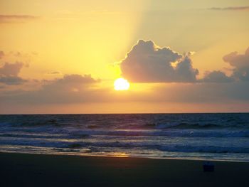 Scenic view of sea at sunset