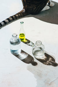 High angle view of bottles on table