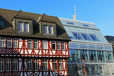 Low angle view of building against blue sky