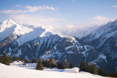 Scenic view of snow mountains against sky