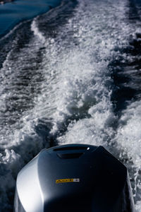 Close-up of coin-operated binoculars on sea