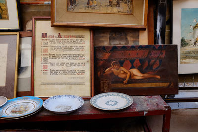 Close-up of old objects on table