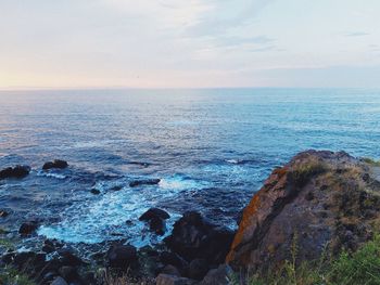 Scenic view of sea against sky during sunset