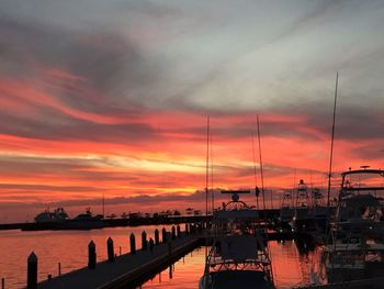 Scenic view of dramatic sky over sea during sunset