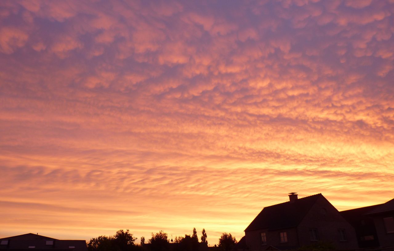 sunset, building exterior, architecture, built structure, sky, orange color, cloud - sky, house, silhouette, residential structure, low angle view, beauty in nature, cloud, scenics, residential building, cloudy, dramatic sky, nature, town, outdoors