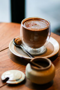 Close-up of coffee cup on table