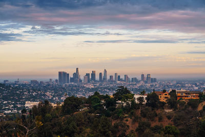 View of buildings against sky during sunset