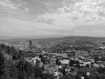 High angle shot of townscape against sky