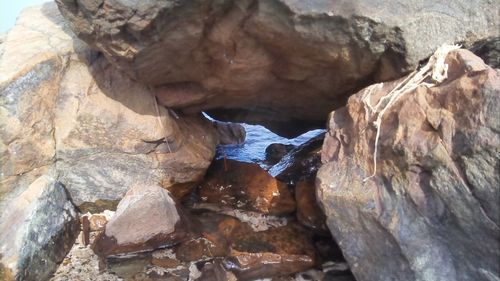 Close-up of rock formation in water