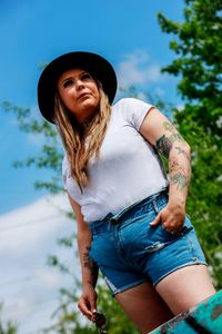 Beautiful young woman wearing hat
