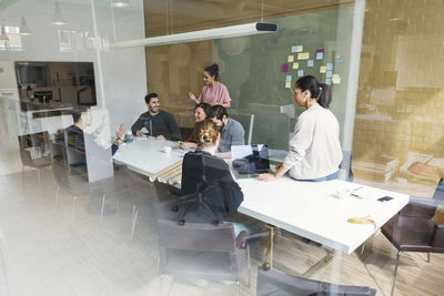 Creative team of business people having discussion in conference room