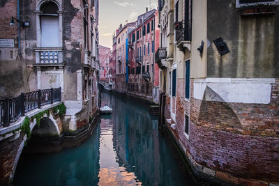 Narrow canal along buildings