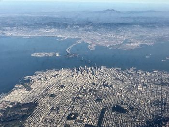 High angle view of city by sea