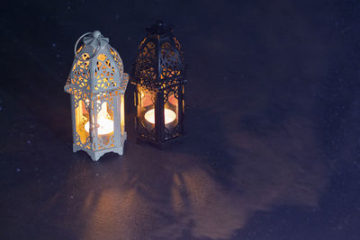 High angle view of illuminated lantern at night