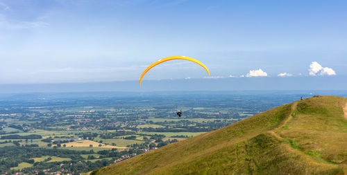 Paragliders flying from the malvern hills, malvern, uk