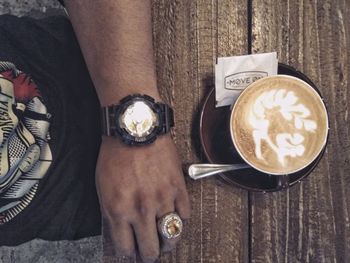 Directly above shot of coffee cup on table