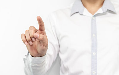 Midsection of man with text against white background