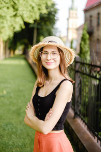 Portrait of a beautiful young woman wearing hat