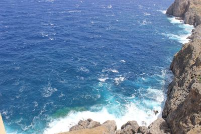 Scenic view of sea against blue sky